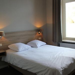 Kamer met een Queen Size Bed